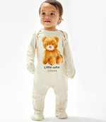 Load image into Gallery viewer, Babies sleep suit with fold over mits to the hands and footies to the bottom. Light Beige colour with a brown teddy design to the front and a personalised name underneath. Pop button fastening to the legs.