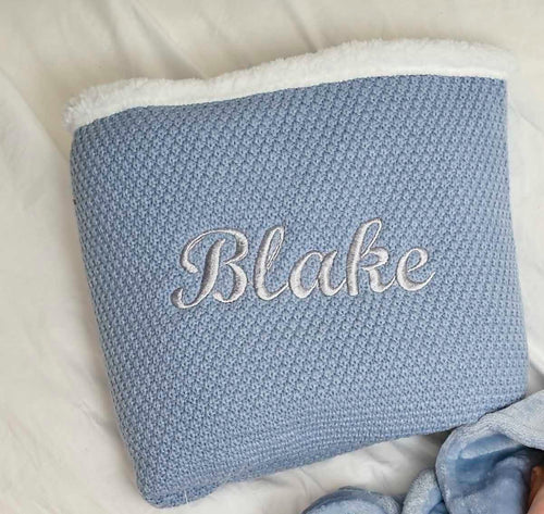 Babies Dusky Blue knitted blanket is super soft and thick, perfect for keeping your little one warm and cosy. With a sherpa lining to the back and embroidered personalisation to the front. Size 75x90cm.
