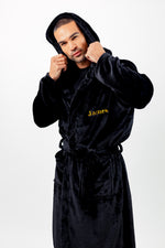Load image into Gallery viewer, Boys plush maxi personalised dressing gown in a luxurious Black colour. Made from super soft thick fabric, maxi length, large hood to the back and adjustable tie around the waist. Complete with a special touch of personalisation to the chest - this is embroidered especially for you. Making the perfect personalised gift for children.