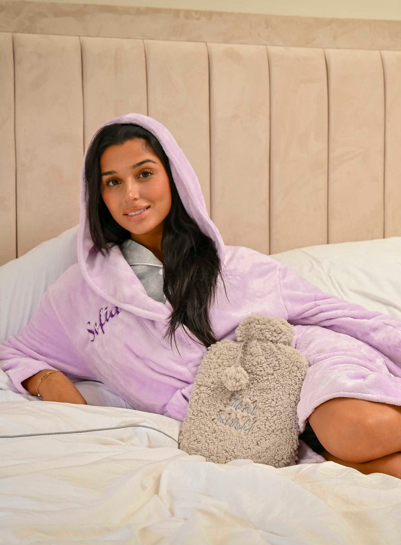 This ladies personalised dressing gown in Lilac is made out of a luxurious, plush, super soft fabric, perfect for keeping you warm on a cold day. This dressing gown has a hood to the back, pockets on either side and a tie around the waist. This dressing gown can be personalised with any name you wish, for special requests please leave this in the notes section of your order. This will be embroidered. You can select the colour of the thread this will be personalised in.