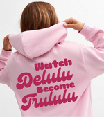 Load image into Gallery viewer, A comfortable ladies oversized light pink cotton hoodie with a printed design in a curvy font hot pink writing ... Watch Delulu become Trululu... A catchy design sure to catch peoples eye !