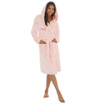 Load image into Gallery viewer, This ladies personalised dressing gown in Light Pink is made out of a super soft fleece fabric, perfect for keeping you warm on a cold day. This dressing gown has a hood to the back, pockets on either side and a tie around the waist. This dressing gown can be personalised with any name you wish, for special requests please leave this in the notes section of your order. This will be embroidered. You can select the colour of the thread this will be personalised in.