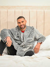 Our mens plush hooded dressing gown in Charcoal is made from a super soft fabric, then length is just to the knee, with a hood to the back, pockets on either side and a tie around the waist for adjusting. Completed with your personalised name embroidered to the chest. 