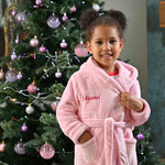 Load image into Gallery viewer, Girls plush maxi personalised dressing gown in a luxurious Light Pink colour. Made from super soft thick fabric, maxi length, large hood to the back and adjustable tie around the waist. Complete with a special touch of personalisation to the chest - this is embroidered especially for you. Making the perfect personalised gift for children.