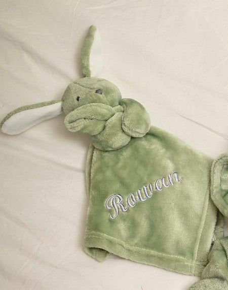 Our Babies personalised bunny comforter in Green is crafted from super soft plush material, this comforter will keep your baby snug and content. Complete with your babies name personalised/embroidered to the front.