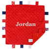 Babies unisex red personalised soft plush comforter. Personalisation embroidered in the middle in a white cotton which complements the accent tags around the edges. A nice square soft comforter to help keep the little one content.