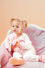 Load image into Gallery viewer, A sweet little set of bay/toddler girls personalised pyjama set white with light pink elephant print, with matching light pink cuffs. Personalised on the left chest with the name in pink. A lovely soft pyjama set which would be a great addition to any littles ones bed time wardrobe. 

