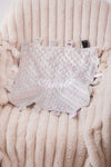 Babies unisex beige personalised soft plush comforter. Personalisation embroidered in the middle in a light beige cotton which complements the accent tags around the edges. A nice square soft comforter to help keep the little one content.
