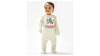 A cream personalised unisex soft cotton 
 sleep suit for babies with a Christmas theme print, including a design with Santa Claus, Christmas tree and a snowman. Personalisation to the middle below the design in red print with first Christmas written underneath. A sure way to get a first Christmas photo of your baby. 