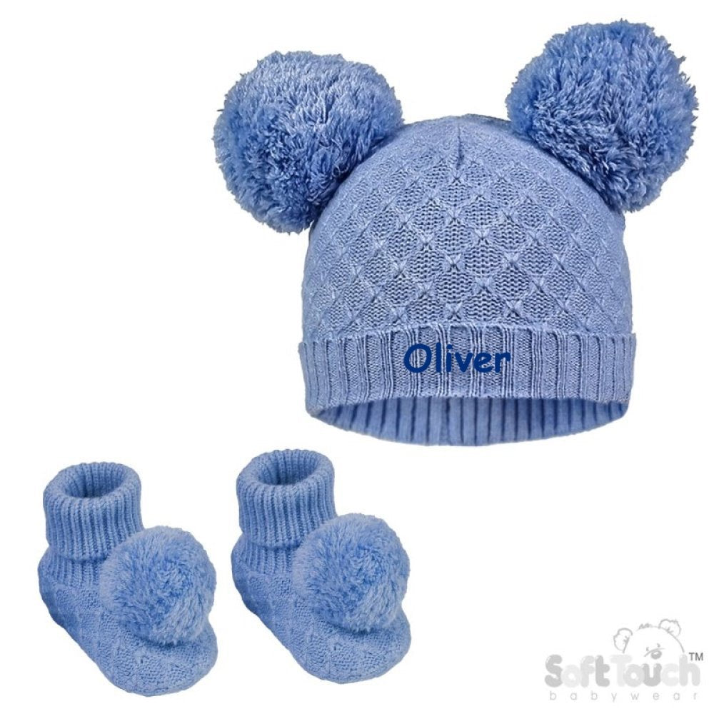 Baby boy's cable knitted hat and bootees personalised soft cotton in a lovely blue. The hat and bootees both complete with cute pom pom's. A perfect gift to keep those little ones warm through those colder months.