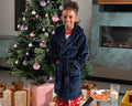 Boys plush maxi personalised dressing gown in a luxurious Navy colour. Made from super soft thick fabric, maxi length, large hood to the back and adjustable tie around the waist. Complete with a special touch of personalisation to the chest - this is embroidered especially for you. Making the perfect personalised gift for children. 