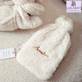 Ladies Cream Hot Water Bottle personalised with embroidery to the front. 