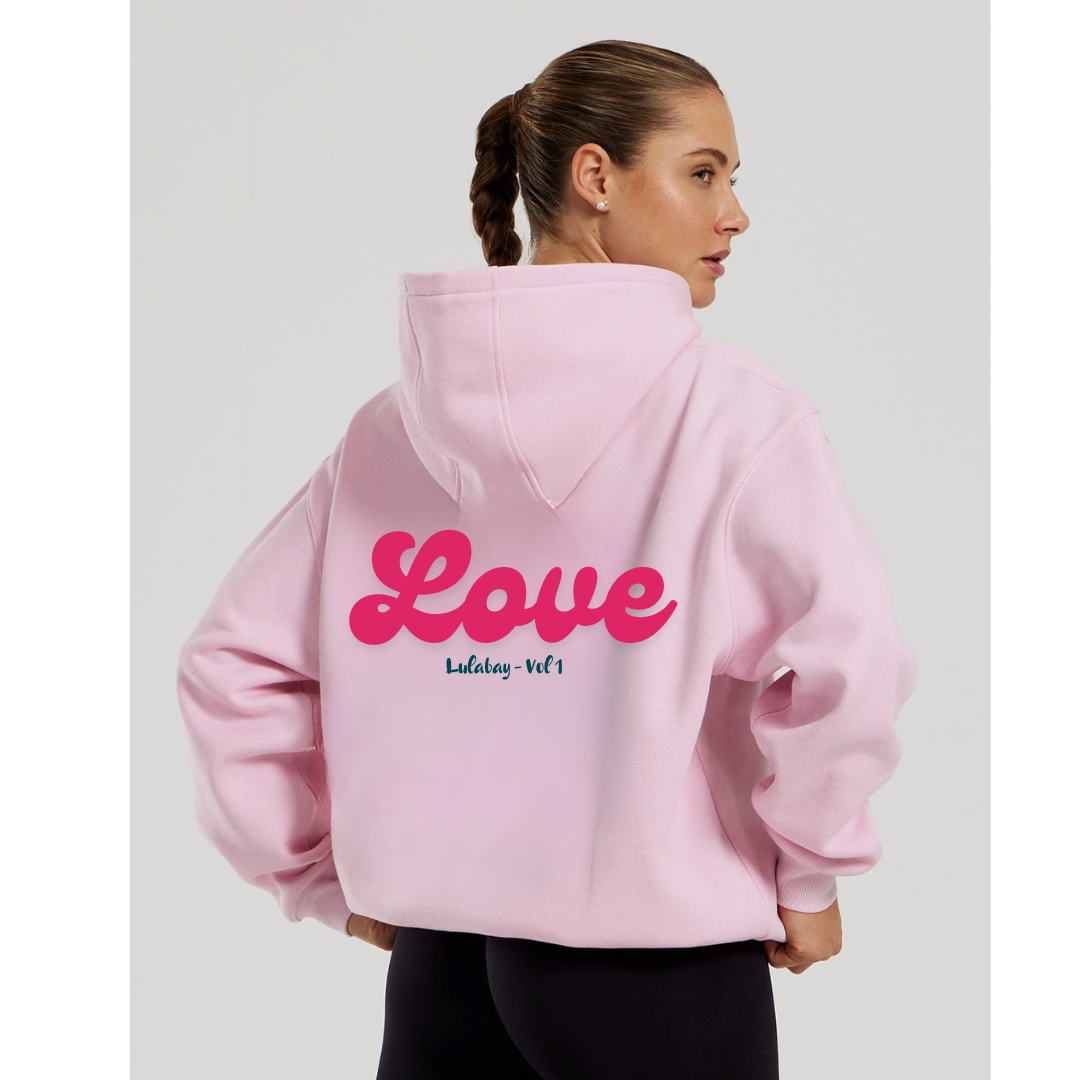 Ladies light pink oversized hoodie with bright pink printed bold curved 'Love' writing on the back with a subtle black printed Lulabay -vol 1 neatly underneath. A nice comfortable hoody ideal to wear daily or even at the gym ! 