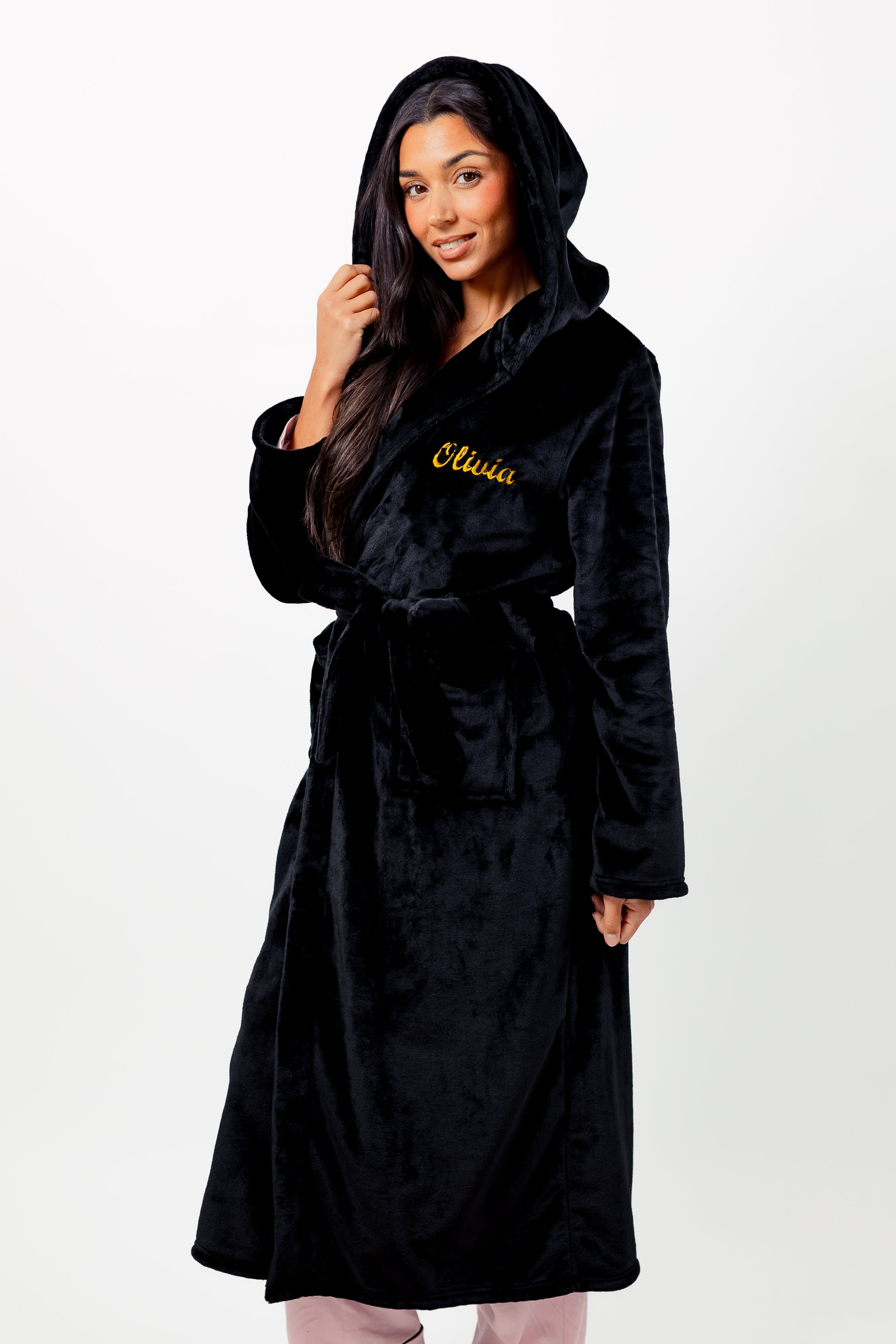 Ladies plush maxi personalised dressing gown in a luxurious Black colour. Made from super soft thick fabric, maxi length, large hood to the back and adjustable tie around the waist. Complete with a special touch of personalisation to the chest - this is embroidered especially for you. Making the perfect personalised gift for her. 