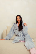 Ladies plush maxi personalised dressing gown in a luxurious Light Grey colour. Made from super soft thick fabric, maxi length, large hood to the back and adjustable tie around the waist. Complete with a special touch of personalisation to the chest - this is embroidered especially for you. Making the perfect personalised gift for her. 