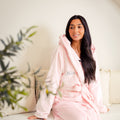 Ladies plush maxi personalised dressing gown in a luxurious Light Pink colour. Made from super soft thick fabric, maxi length, large hood to the back and adjustable tie around the waist. Complete with a special touch of personalisation to the chest - this is embroidered especially for you. Making the perfect personalised gift for her. 