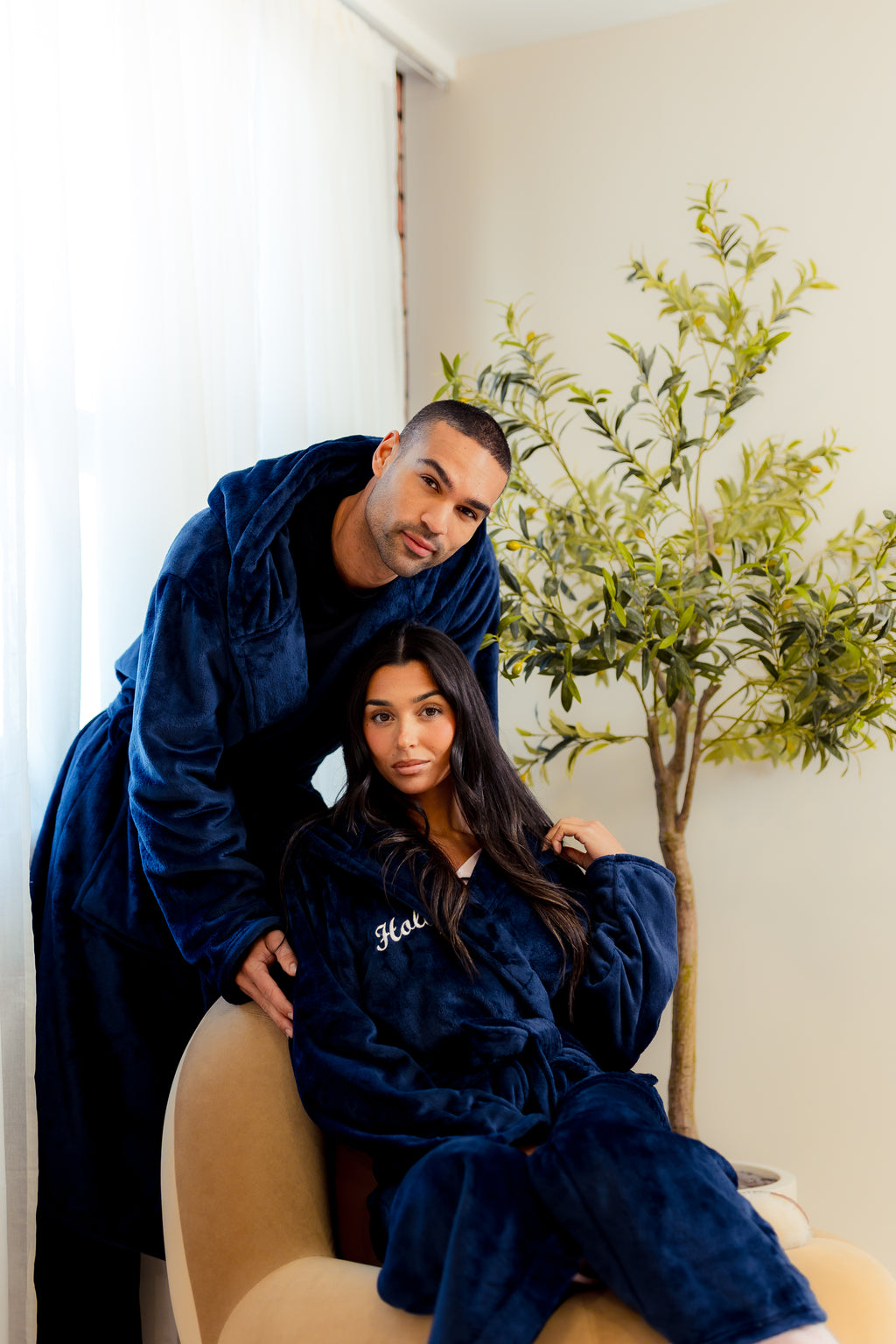 Ladies plush maxi personalised dressing gown in a luxurious Navy colour. Made from super soft thick fabric, maxi length, large hood to the back and adjustable tie around the waist. Complete with a special touch of personalisation to the chest - this is embroidered especially for you. Making the perfect personalised gift for her. 