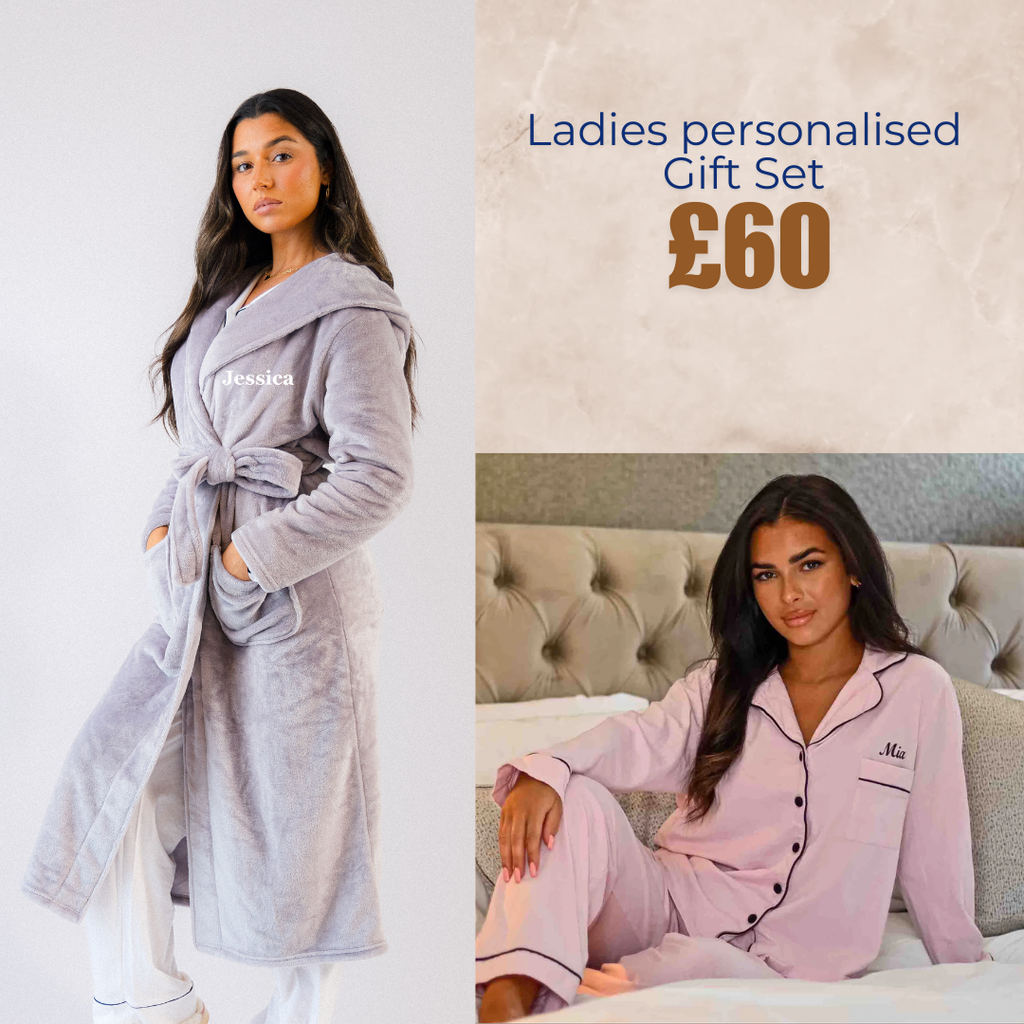 A ladies personalised set consisting of a soft plush grey dressing gown with a wrap around tie rope , personalised on the left chest. Pyjamas are a soft pink with contrasting black trim around the collar and accompanied with black button detail down the front a small pocket on the front left of the chest which can be personalised above. 