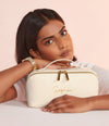 Ladies personalised make up bag- with an open flat design and a name of your choice personalised on the front with embroidery. Cream colour with gold zips and gold embroidery for the personalised name. 