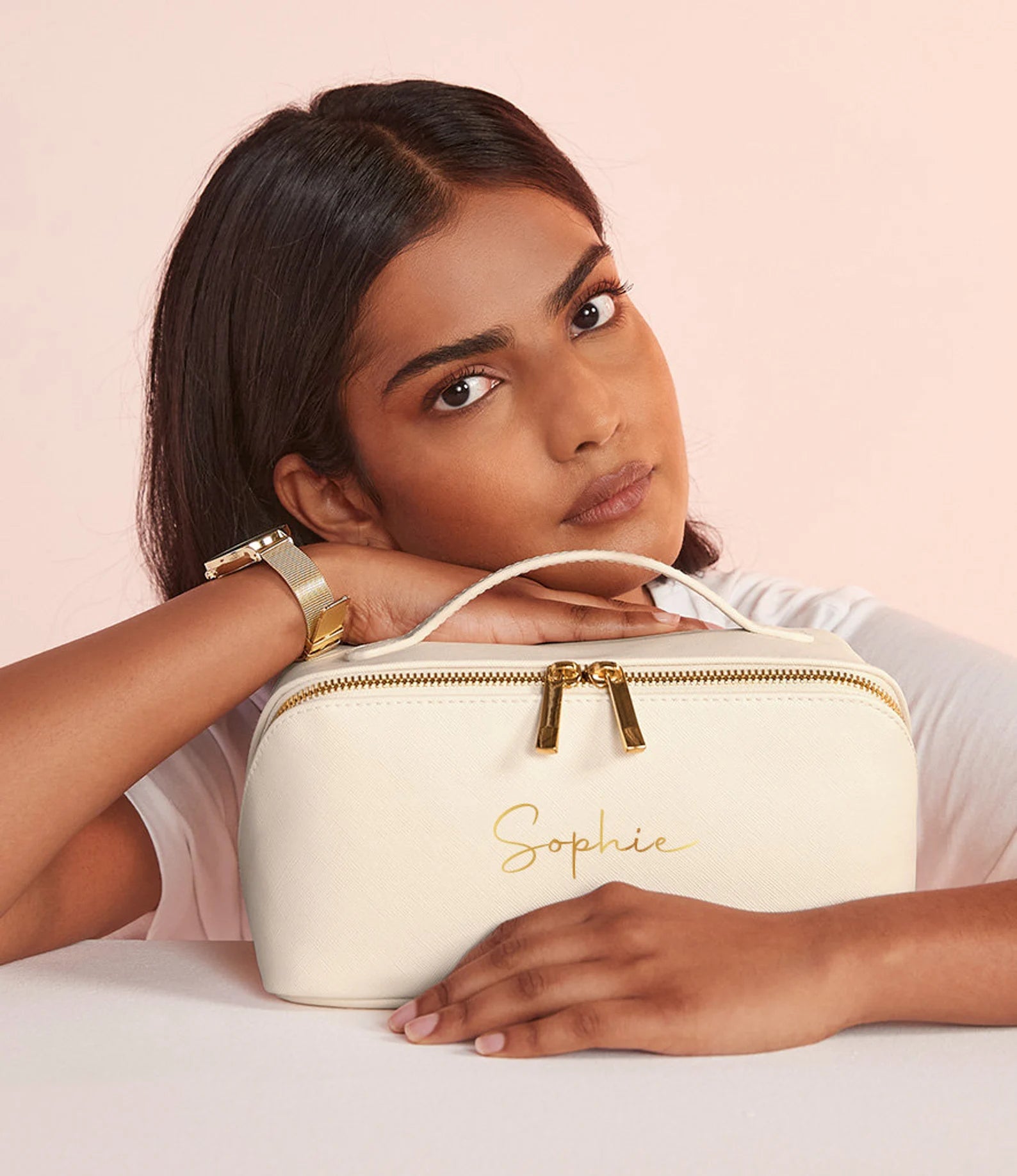 Ladies personalised make up bag- with an open flat design and a name of your choice personalised on the front with embroidery. Cream colour with gold zips and gold embroidery for the personalised name. 