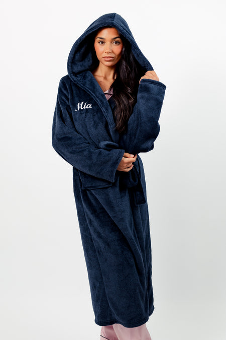 Ladies two tone plush maxi personalised dressing gown in a luxurious Navy and Black two tone mix colour. Made from super soft thick fabric, maxi length, large hood to the back and adjustable tie around the waist. Complete with a special touch of personalisation to the chest - this is embroidered especially for you. Making the perfect personalised gift for her. 