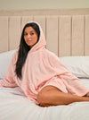 Ladies oversized hoody in Light Pink is perfect for the cold nights. With super soft plush fabric, hood to the back and a kangaroo pocket to the front. Completed with a fully lined hood and your name embroidered to the front chest.