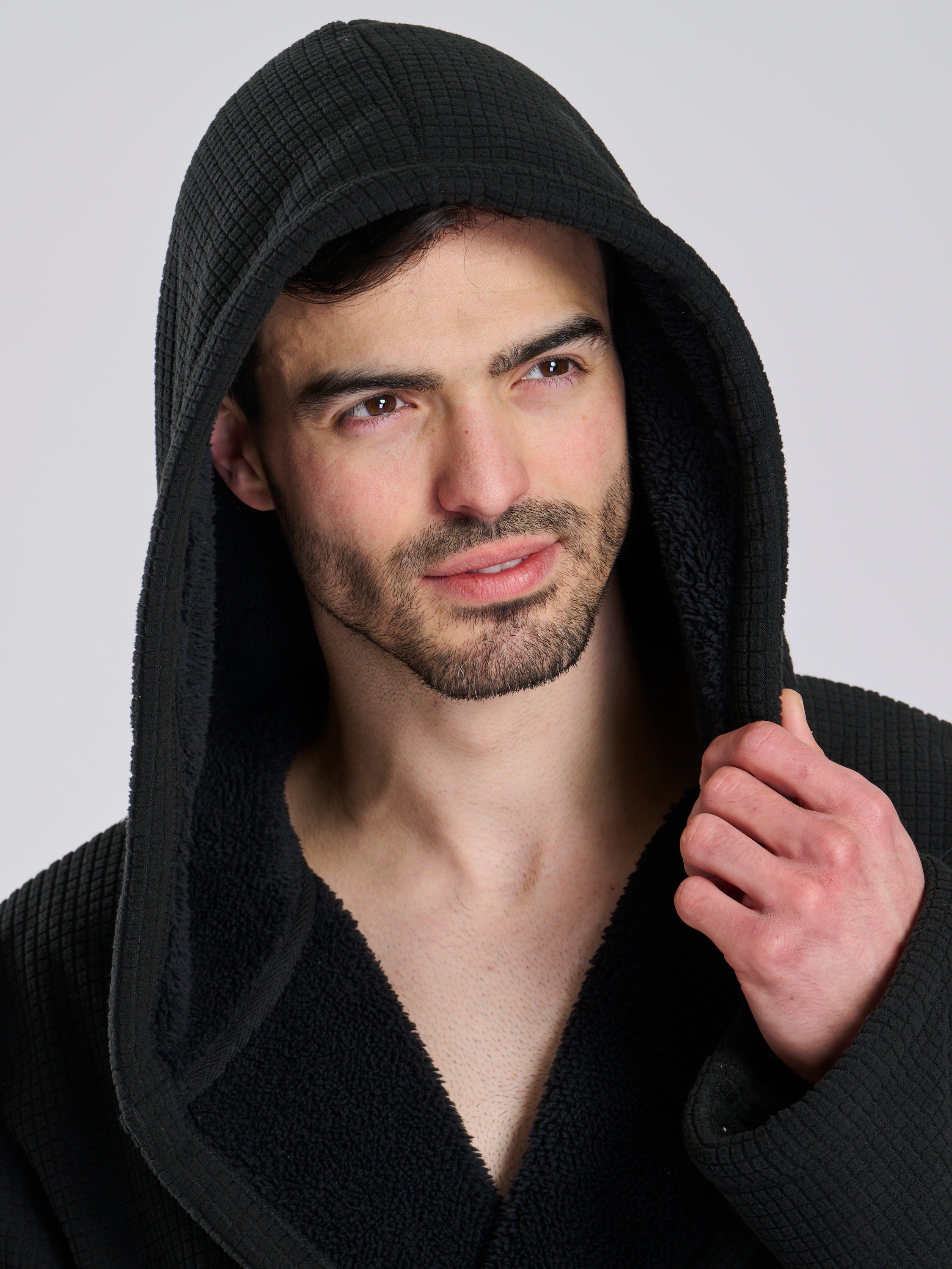 Here we have from the mens collection a personalised waffle material with Borg lining black dressing gown. You could have this embroidered with a name of your choice - embroidered in a white cotton. It has a Borg lined hood, two front pockets and a wrap around tie at the waist. What a great personalised gift such a great way to keep warm on the colder evenings. 