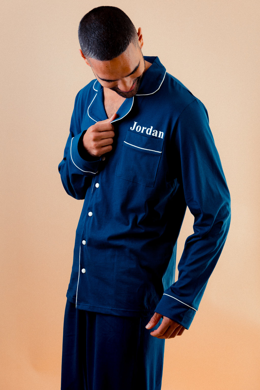 Mens jersey button up personalised pyjama in a lovely Navy colour with White trims, buttons and personalisation. 