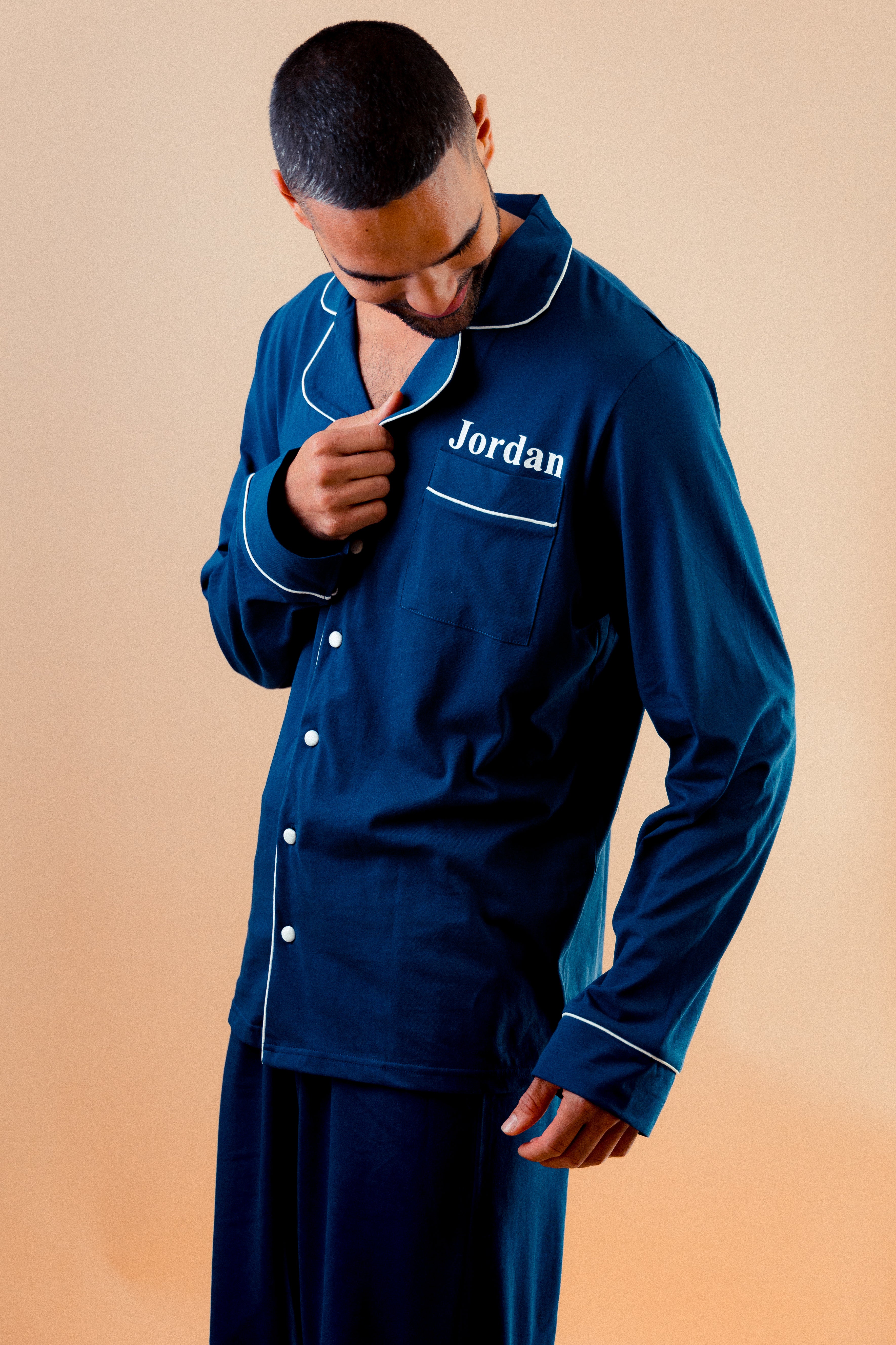 Mens jersey button up personalised pyjama in a lovely Navy colour with White trims, buttons and personalisation. 