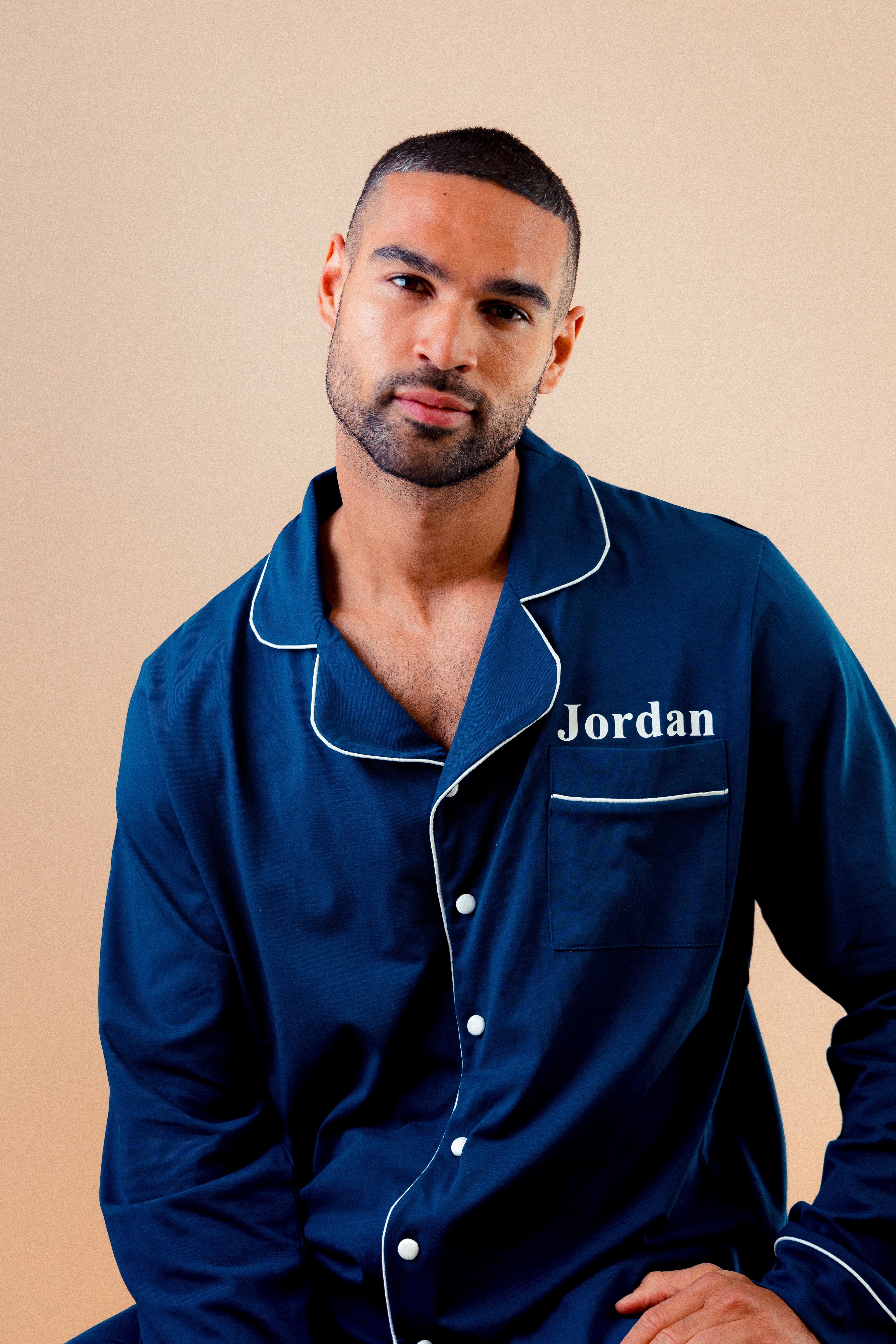 Mens jersey button up personalised pyjama in a lovely Navy colour with White trims, buttons and personalisation. 