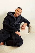 Load image into Gallery viewer, Mens premium maxi personalised dressing gown in a luxurious Black colour with a charcoal contrast lined hood and front panel of the close of the dressing gown. Made from super soft thick fabric, maxi length, large hood to the back and adjustable tie around the waist. Complete with a special touch of personalisation to the chest - this is embroidered especially for you. Making the perfect personalised gift for him. 
