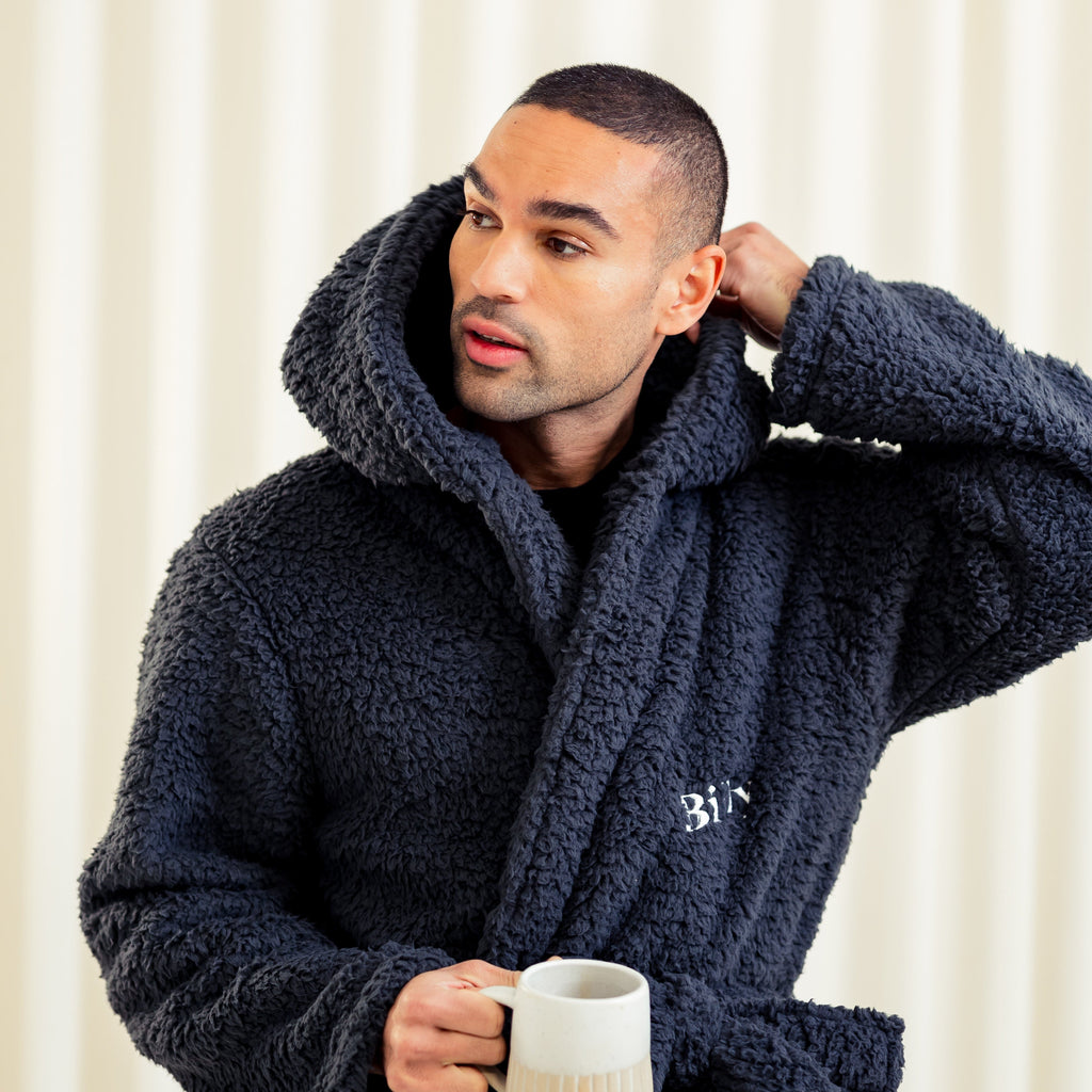 Mens premium maxi personalised dressing gown in a luxurious Charcoal colour. Made from super soft thick fabric, maxi length, large hood to the back and adjustable tie around the waist. Complete with a special touch of personalisation to the chest - this is embroidered especially for you. Making the perfect personalised gift for him. 