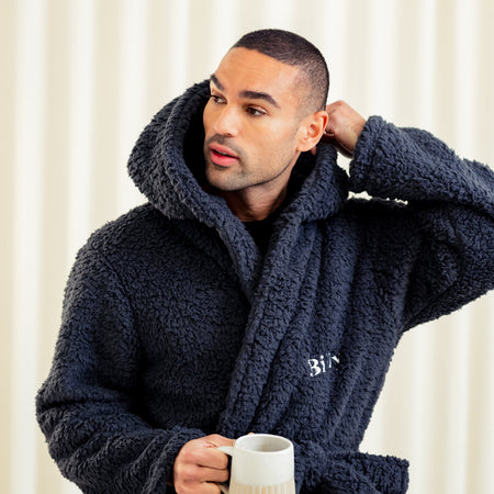 Mens premium maxi personalised dressing gown in a luxurious Charcoal colour. Made from super soft thick fabric, maxi length, large hood to the back and adjustable tie around the waist. Complete with a special touch of personalisation to the chest - this is embroidered especially for you. Making the perfect personalised gift for him. 