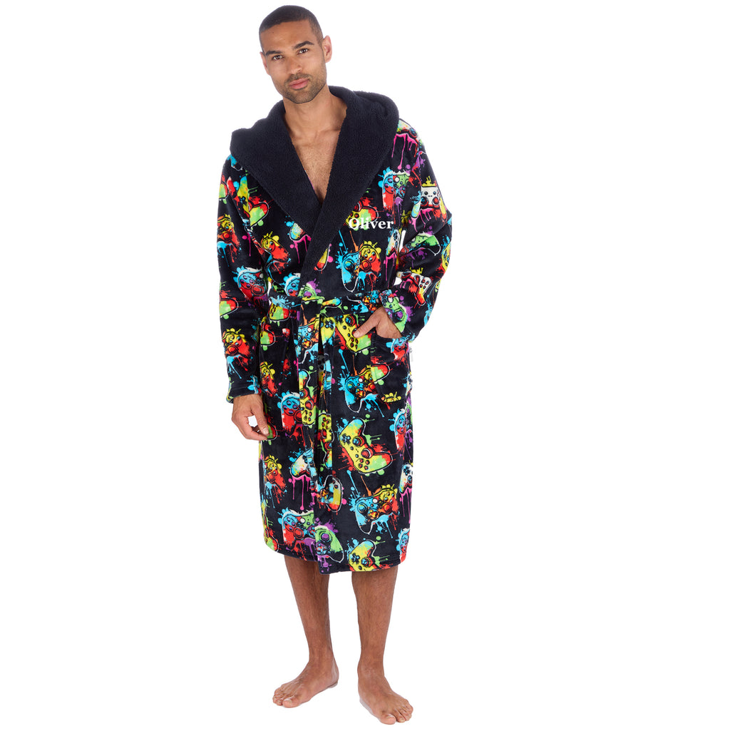 Mens gaming dressing gown personalised to the front with hood and pockets. Adjustable waist tie and a black fleece soft hood lining. Colourful controller design the perfect personalised gift for the gamers! 
