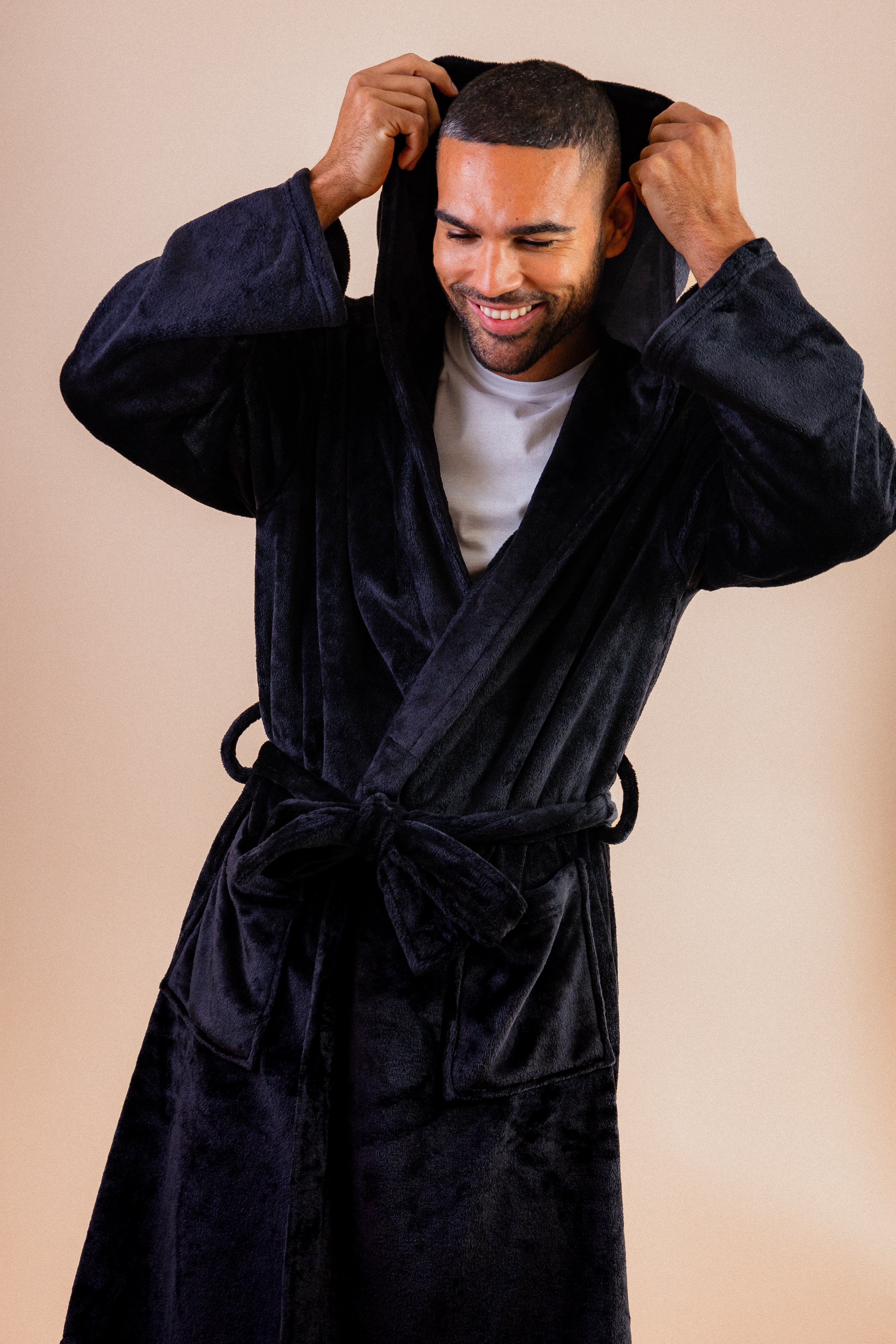 Mens plush maxi personalised dressing gown in a luxurious plush Navy colour. Made from super soft thick fabric, maxi length, large hood to the back and adjustable tie around the waist. Complete with a special touch of personalisation to the chest - this is embroidered especially for you. Making the perfect personalised gift for him. 