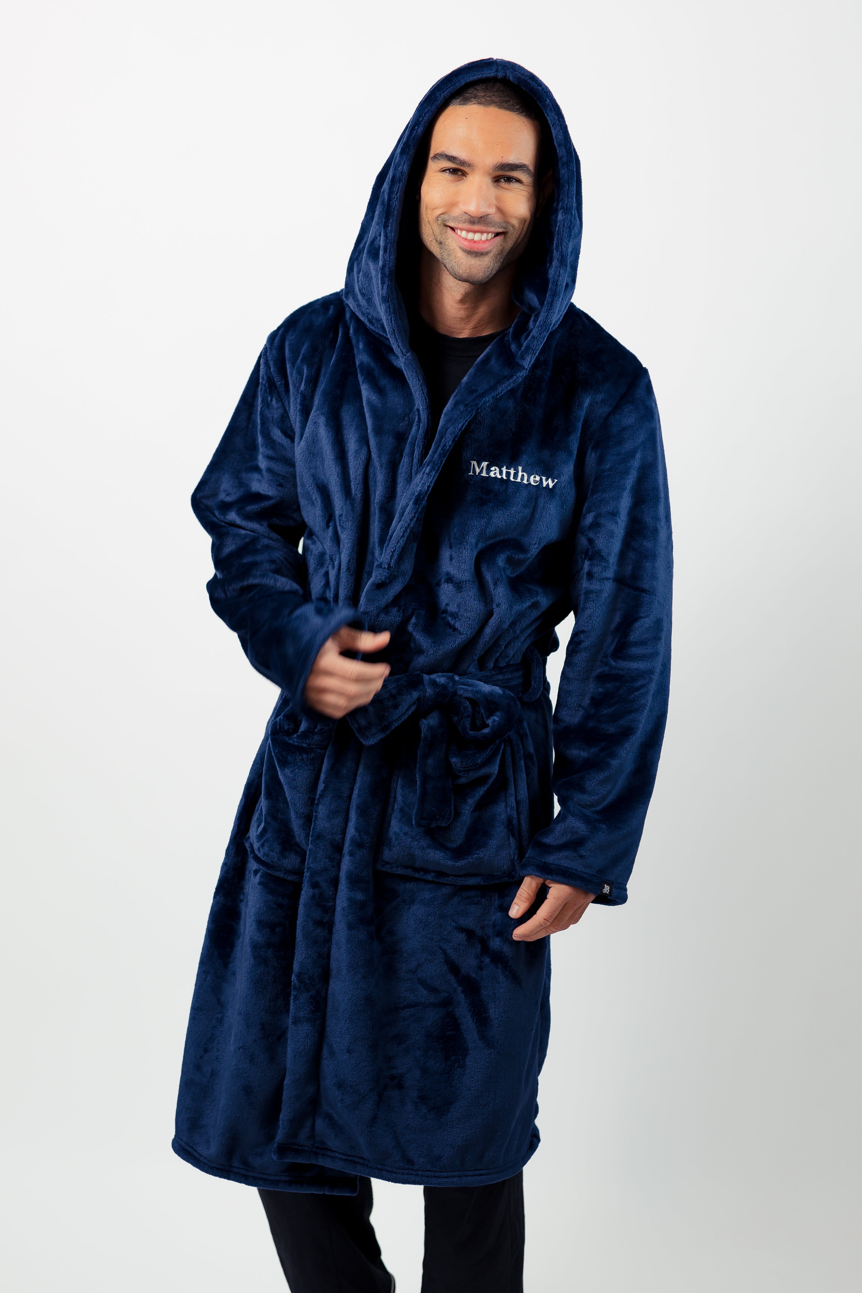 Mens plush maxi personalised dressing gown in a luxurious plush Navy colour. Made from super soft thick fabric, maxi length, large hood to the back and adjustable tie around the waist. Complete with a special touch of personalisation to the chest - this is embroidered especially for you. Making the perfect personalised gift for him. 