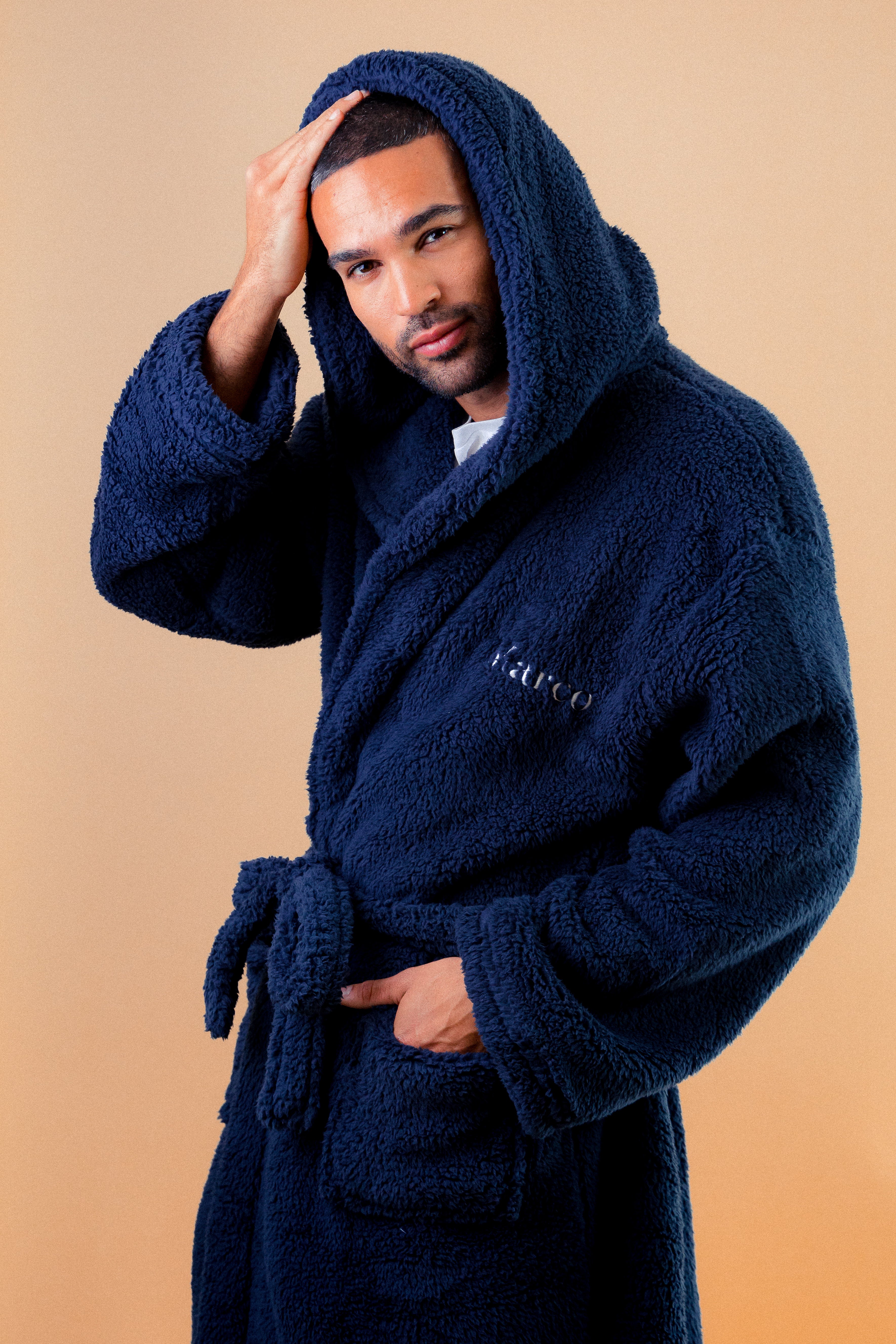 Mens premium maxi personalised dressing gown in a luxurious Navy colour with a charcoal contrast lined hood and front panel of the close of the dressing gown. Made from super soft thick fabric, maxi length, large hood to the back and adjustable tie around the waist. Complete with a special touch of personalisation to the chest - this is embroidered especially for you. Making the perfect personalised gift for him. 