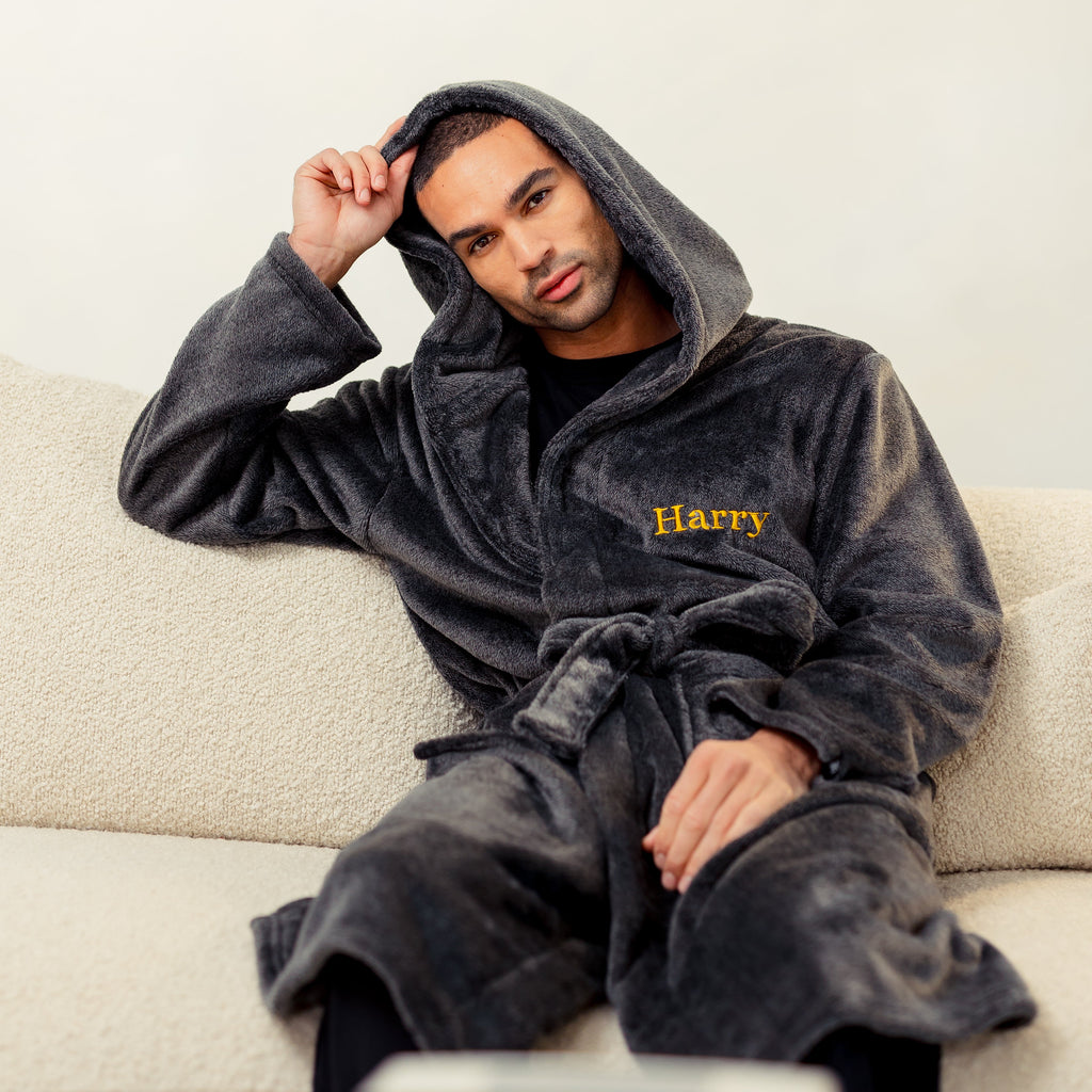 Mens two tone plush maxi personalised dressing gown in a luxurious Charcoal and Black two tone mix colour. Made from super soft thick fabric, maxi length, large hood to the back and adjustable tie around the waist. Complete with a special touch of personalisation to the chest - this is embroidered especially for you. Making the perfect personalised gift for him. 