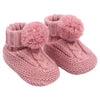baby cable knit pom pom bootees | unisex knitted baby bootees | cable knit baby booties with pom poms | cosy newborn knitted bootees
