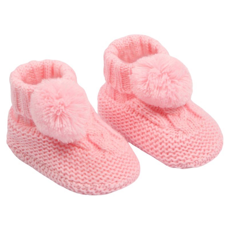 baby cable knit pom pom bootees | unisex knitted baby bootees | cable knit baby booties with pom poms | cosy newborn knitted bootees