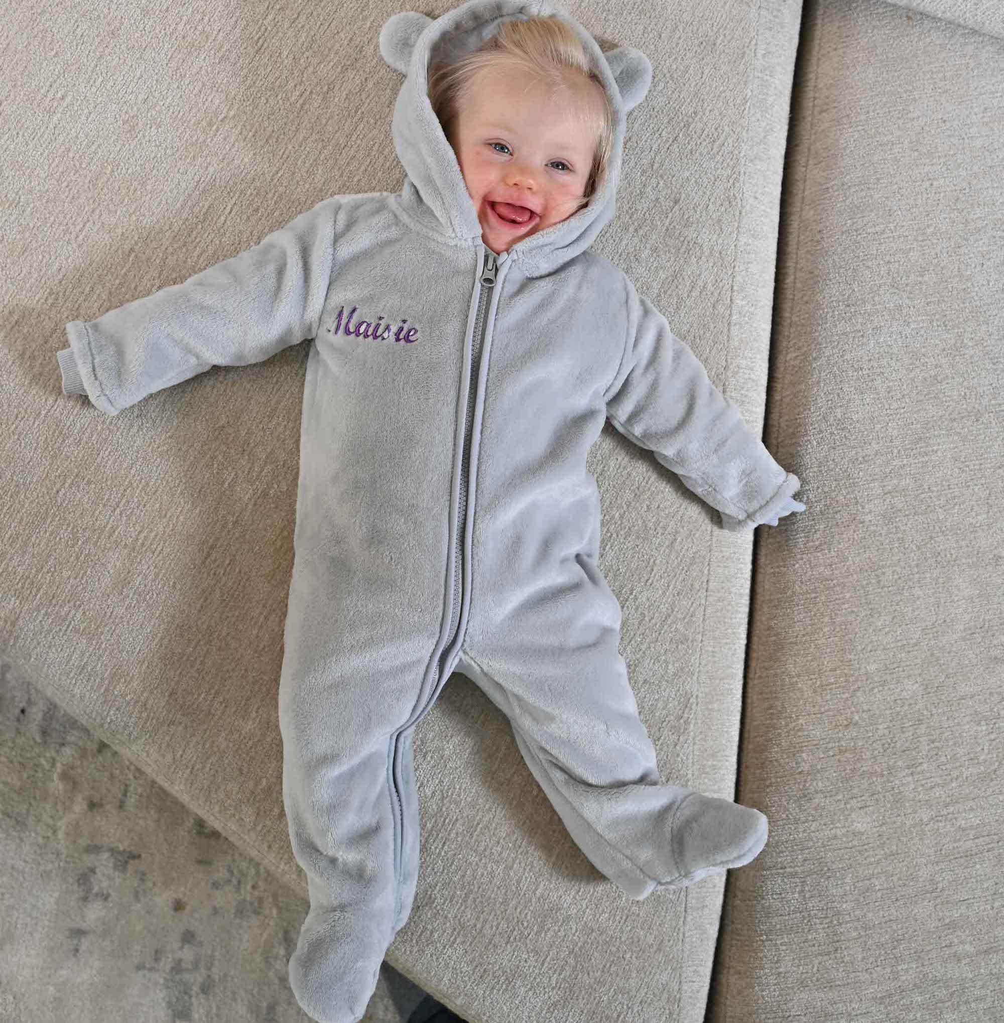 baby wearing grey personalised pram suit from Lulabay