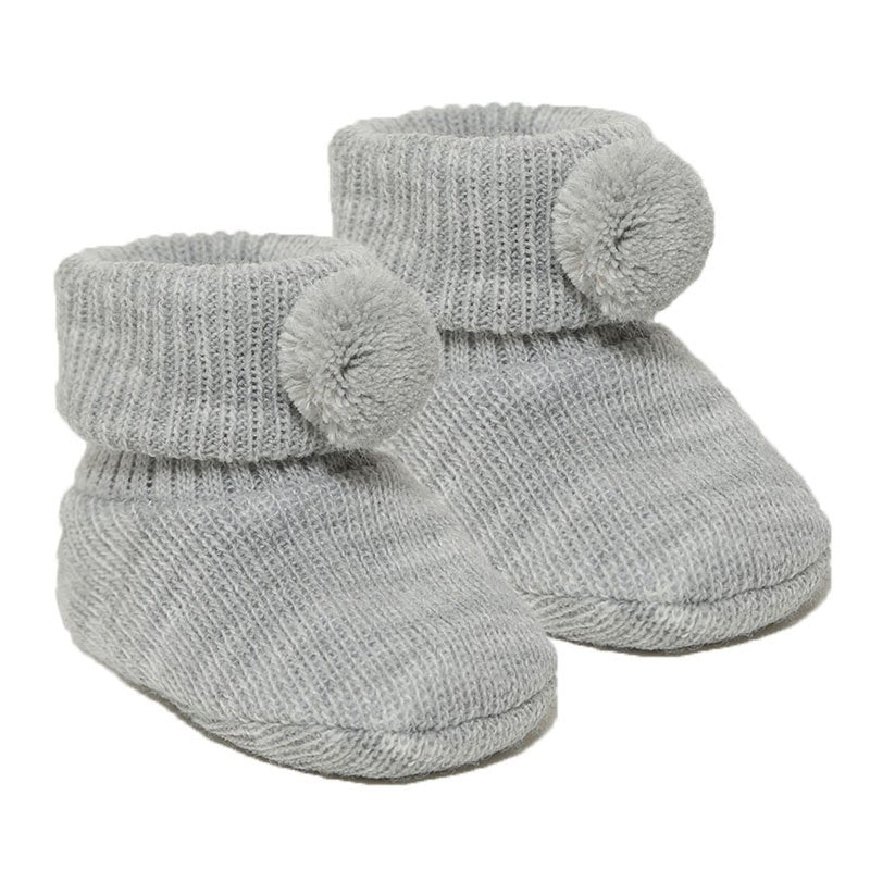 newborn baby pom pom bootees | knitted newborn baby booties | cosy pom pom baby booties | soft acrylic newborn bootees