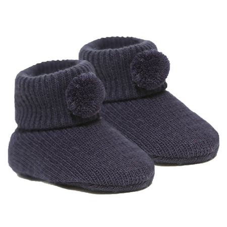 newborn baby pom pom bootees | knitted newborn baby booties | cosy pom pom baby booties | soft acrylic newborn bootees